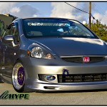 Grey Honda Fit on Purple BBS RS with Gold Hardware