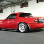 Red Mazda Miata on BBS RM 15x8 +14 15x8.5 +8 with Red Logos