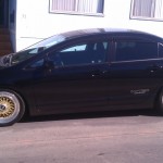 Black Honda Civic Si Sedan on 17" Gold BBS RS