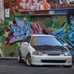 Championship White Honda Civic EK Hatchback on Gold BBS RS