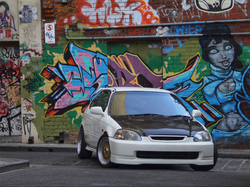 Championship White Honda Civic EK Hatchback on Gold BBS RS