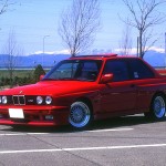 Red BMW M3 E30 on BBS RS