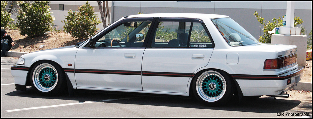 White Honda Civic EF Sedan on Blue BBS RS