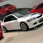 White Mitsubishi Lancer Evolution on BBS RS