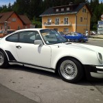 White Porsche 911 on BBS RS with Porche Crest Logos