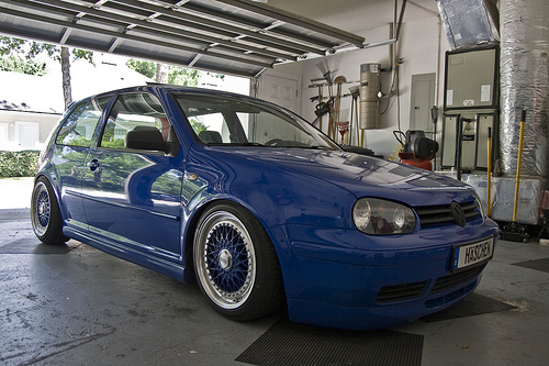 Volkswagen Golf MK4 is lowered on a set of Staggered Blue BBS RS wheels