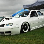 White Volkswagen Jetta MK4 on Black BBS RS with White Lips