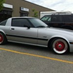 Silver Mazda RX7 FB on 16" Red BBS RS